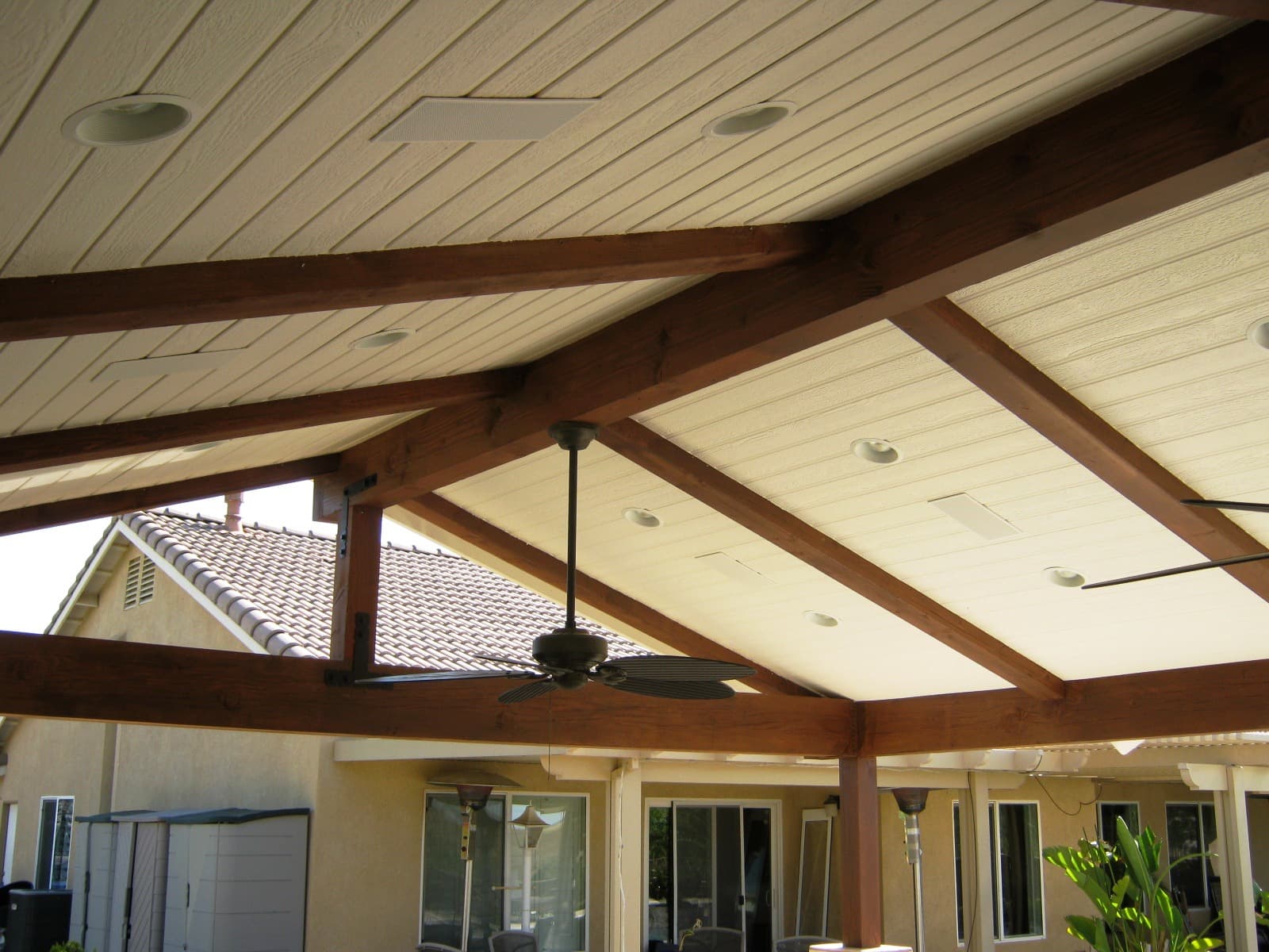 Attached patio cover matching home architecture